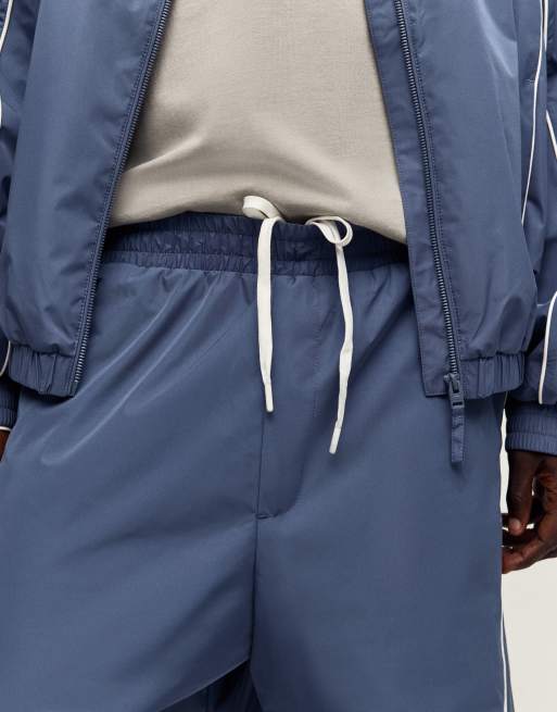 Bershka – Denimblå byxor i techstil och baggy fit, 4 av 4