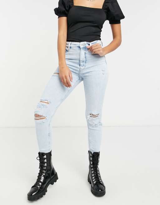 Bershka - Distressed skinny jeans met hoge taille in lichtblauw