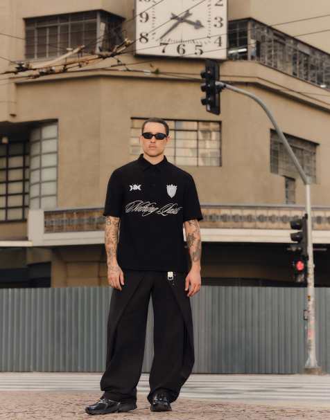 Bershka Double super baggy trousers in black - view 1