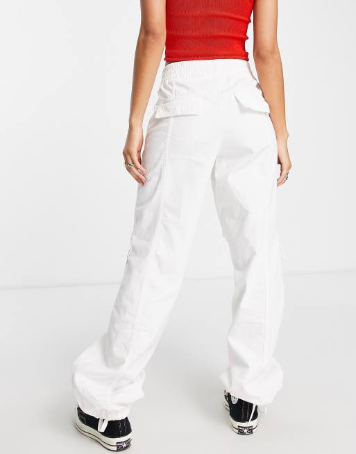 Bershka drawstring parachute cargo pants in white | ASOS