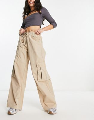 Bershka drawstring waist nylon wide leg cargo trousers in camel - ASOS Price Checker
