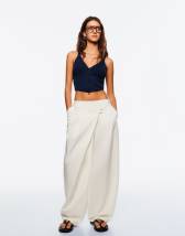 ASOS DESIGN pleat front tapered pants with linen in stone