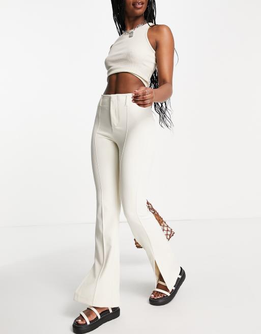Bershka - Elegante flares met split in de zoom in ecru
