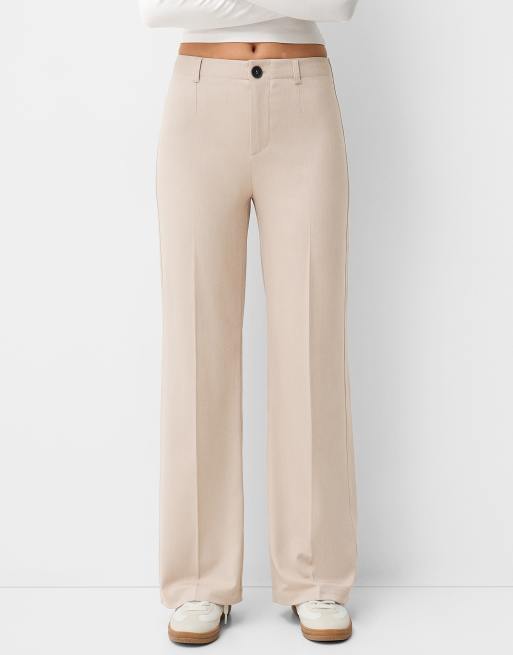 Bershka - Elegante pantalon met wijde pijpen in lichtbeige
