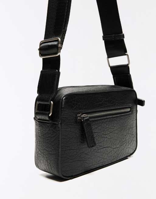 Bershka Embossed star crossbody bag in black, 2 of 4