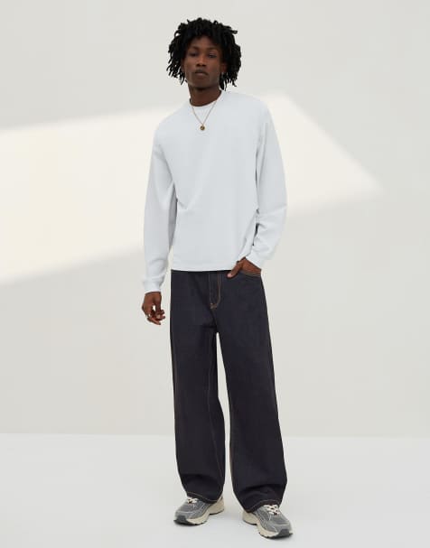 Bershka Embroidered barrel-leg jeans in blue
