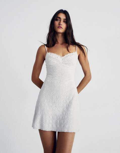 Bershka Embroidered mini dress in white