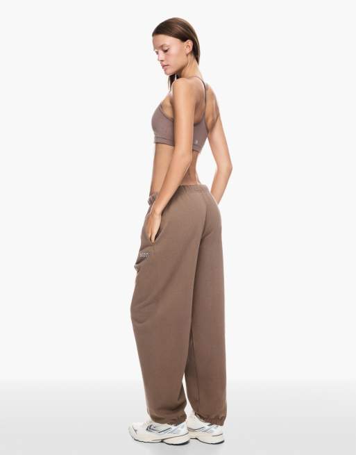 Bershka Embroidered plush joggers in brown