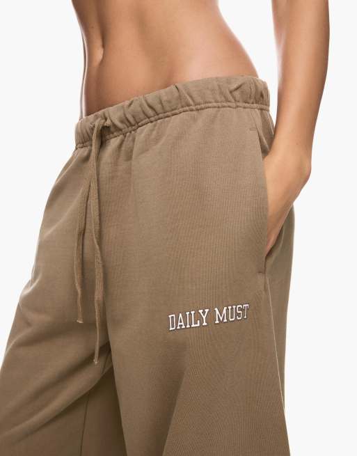Bershka Embroidered plush joggers in brown
