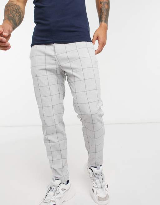 Bershka – Enge, grau karierte Hose