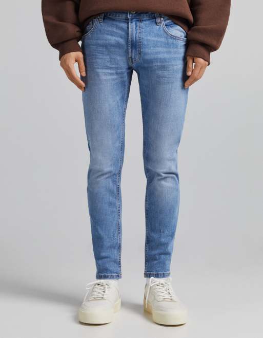 Bershka – Enge Jeans in Mittelblau