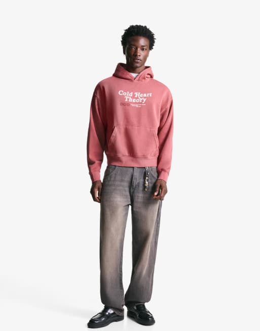 Bershka Faded-effect printed sweatshirt in washed pink | ASOS