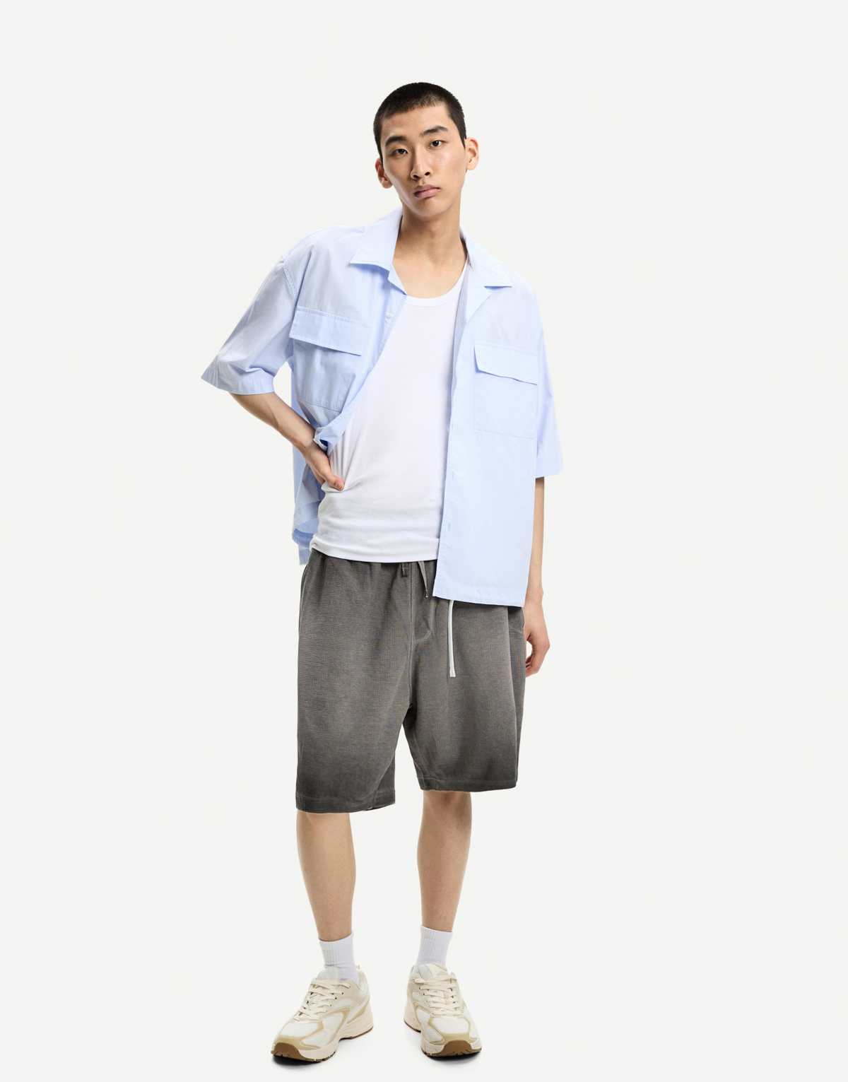 Bershka faded effect waffle knit bermuda shorts in black&white