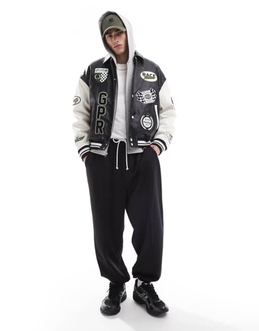 Bershka faux leather contrast sleeve bomber jacket in black | ASOS