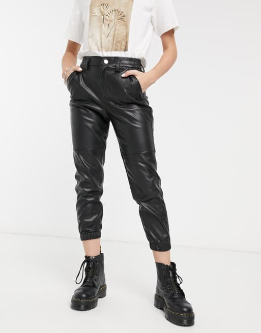 Bershka faux leather joggers in black