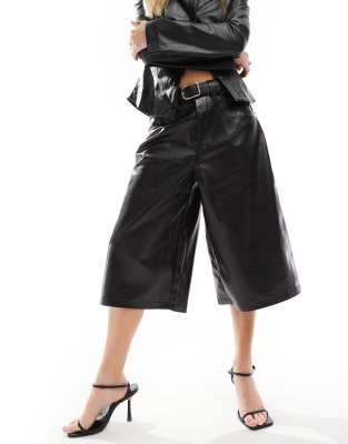 faux leather jorts in black