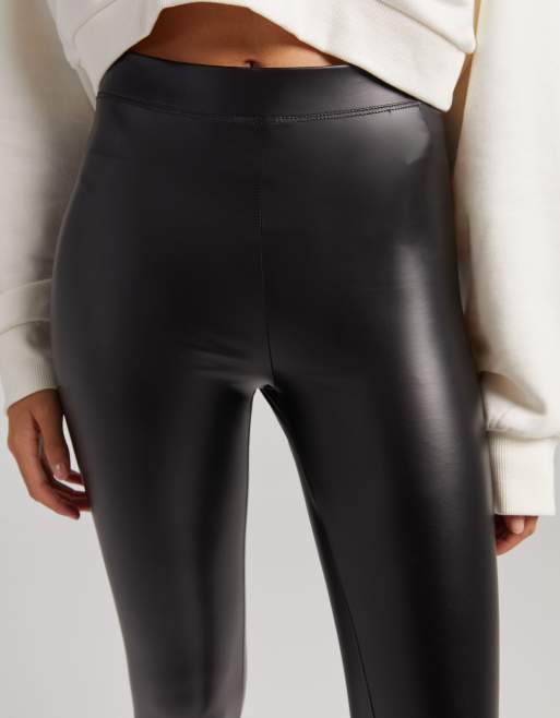 Bershka Petite high waisted faux leather legging in black