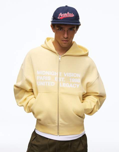 Bershka felpa con cappuccio lavata con stampa e chiusura con zip gialla - view 1