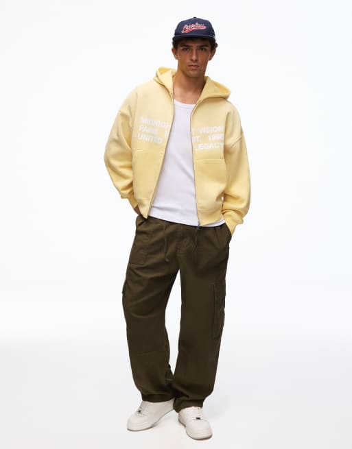 Bershka felpa con cappuccio lavata con stampa e chiusura con zip gialla, 2 di 5