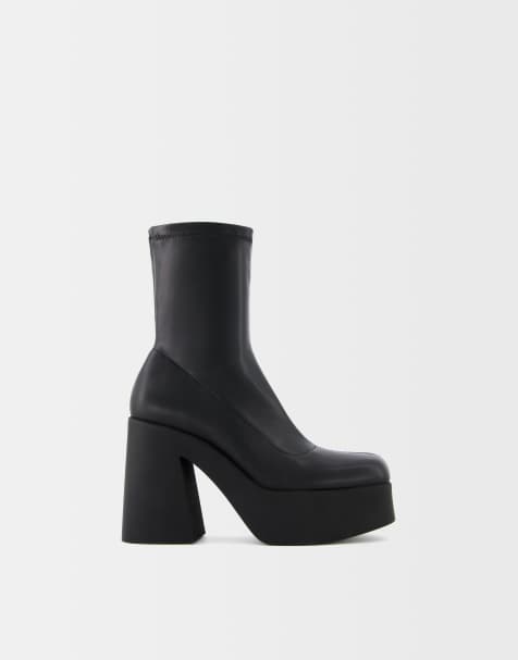 Bershka fitted high heel platform ankle boots in black - view 1