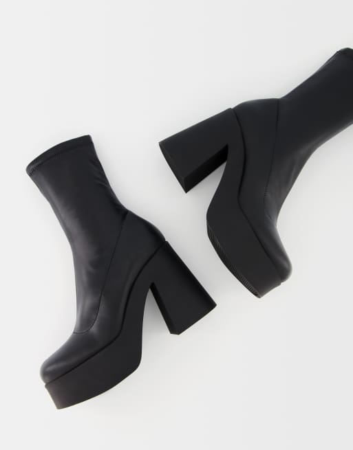Bershka fitted high heel platform ankle boots in black ASOS