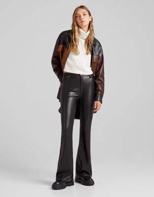 Bershka flare faux leather trouser in black