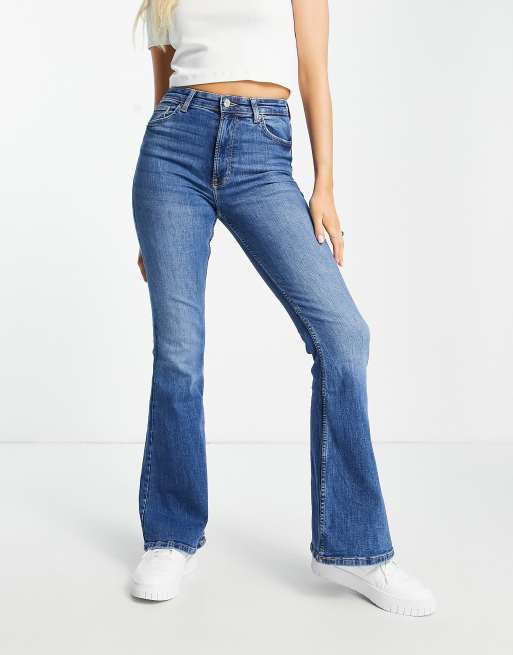 Bershka flare jeans in mid blue | ASOS