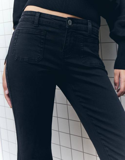 Bershka Flare trousers with flaps and pocket in black, 2 of 4