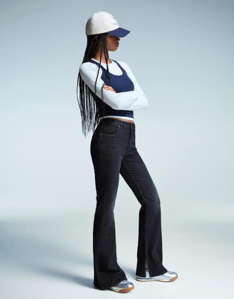 Bershka Flared jeans with slit in black - view 1