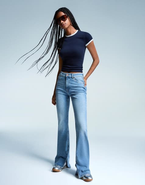 Bershka Flared jeans with slit in mid blue - view 1