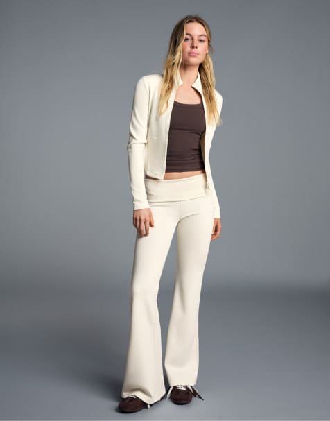 Bershka Flared trousers in ecru - view 1