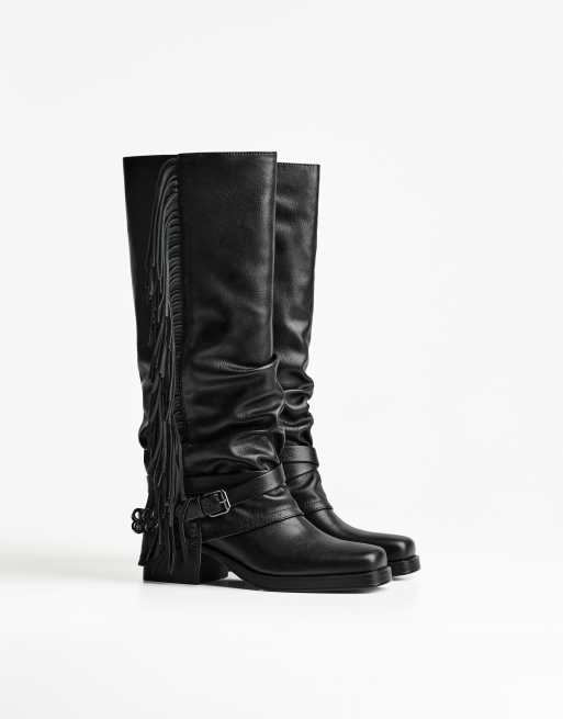 Bershka Flat gaiter boots with fringing in black ASOS