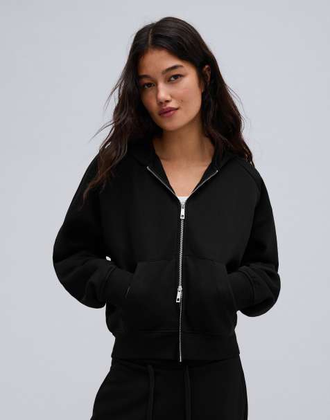 Bershka – Flauschige Kapuzenjacke in Schwarz mit Reißverschluss - view 1