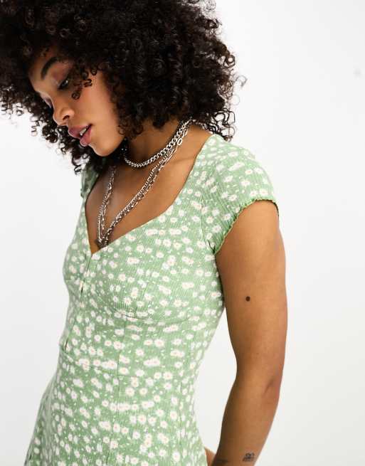 Bershka floral mini dress with spot print in sage green | ASOS