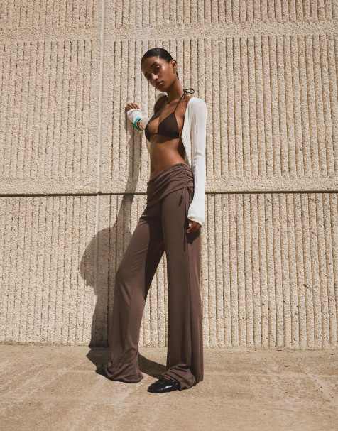 Bershka Flowing flared trousers with tie in sand