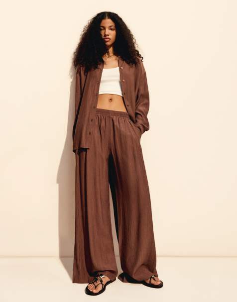 Bershka flowing wide leg textured trousers with drawstring in brown - view 1