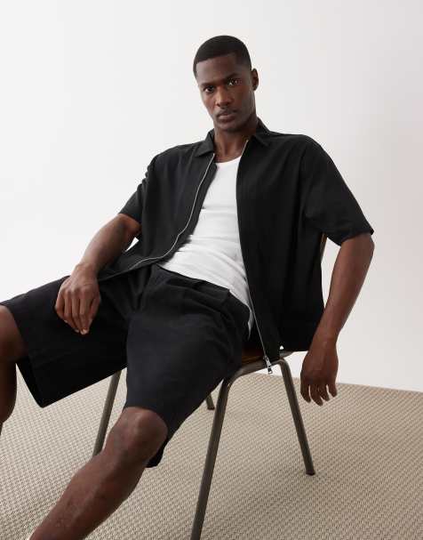 Bershka Fluid boxy short sleeve shirt in black