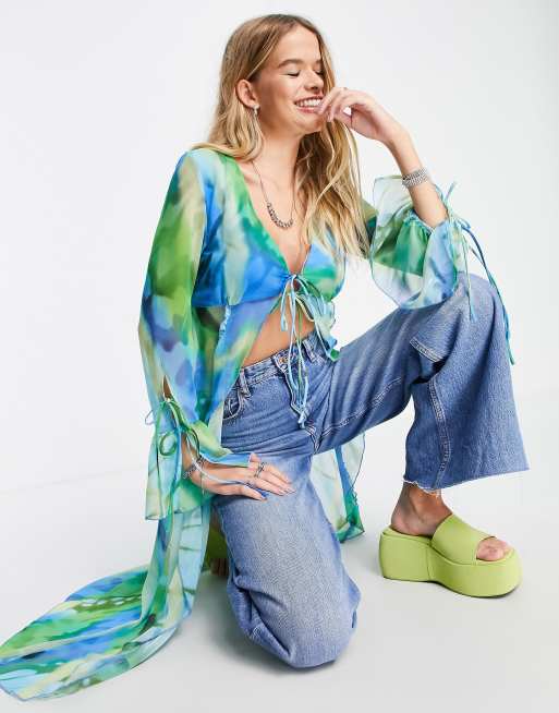 Bershka frill detail tie front blouse in 90s blue butterfly print