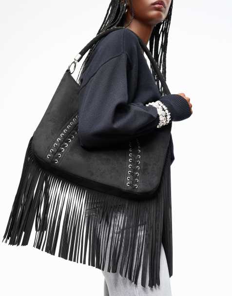 Bershka Fringed faux suede bag with eyelets in black - view 1