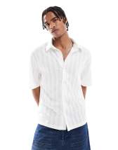 ASOS DESIGN - Bermuda en jean long - Bleu clair délavé teinté