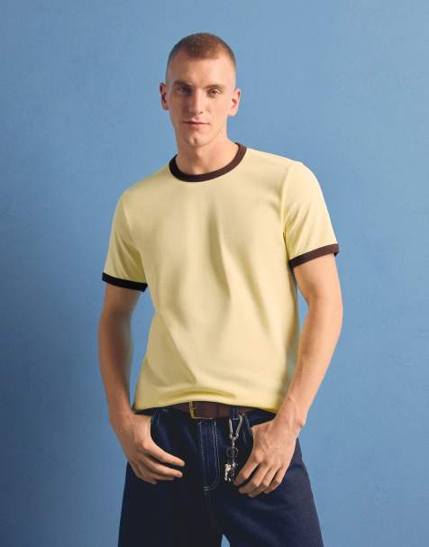 Bershka – Geripptes T-Shirt in Gelb mit Kontrastdetail - view 1