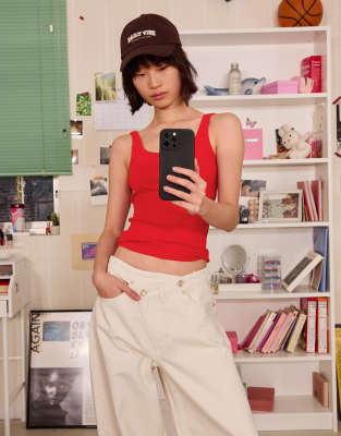 Bershka - Geripptes Trägertop in Koralle-Orange