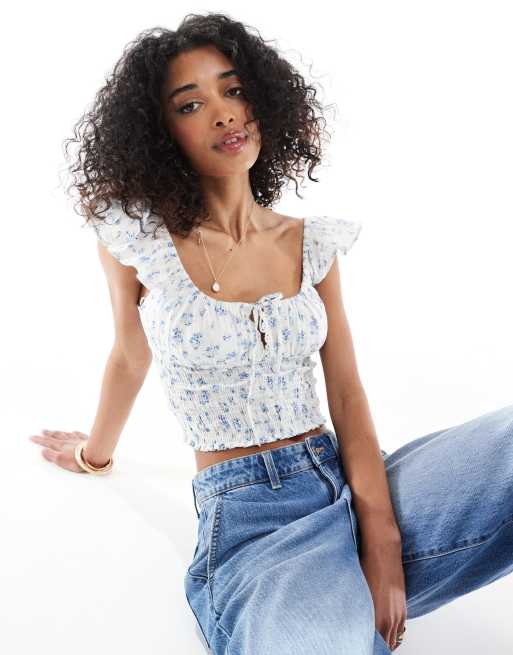 Bershka - Gesmokte melkmeisjestop in ecru met blauwe bloemenprint