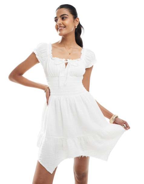 Bershka – Gesmoktes Mini-Milchmädchenkleid in Ecru - view 1