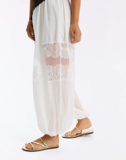 Bershka - Guldfarvede flade slidersandaler med flere remme - view 1