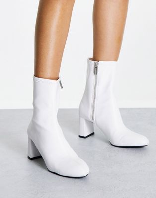 Bershka heeled ankle boot in white
