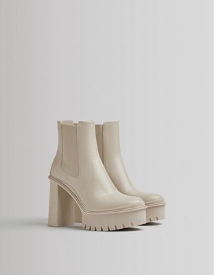 Bershka heeled ankle boot with platform and track sole boot in cream