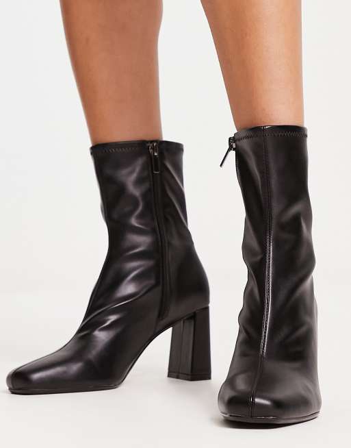 Bershka heeled boots in dark black