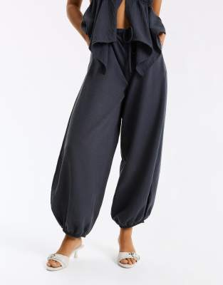  Heeled mules with buckle 
