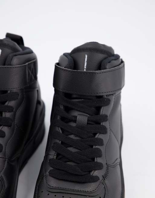 Black high top store velcro sneakers